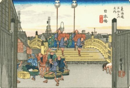 The old wooden bridge looked like this - "Morning Glow at the Nihonbashi," woodblock print by Hiroshige (Wikipedia Image)